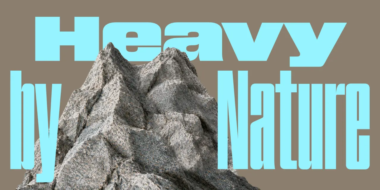 Large rocky mountain peak with bright cyan typography reading "Heavy by Nature" overlaid on a taupe background