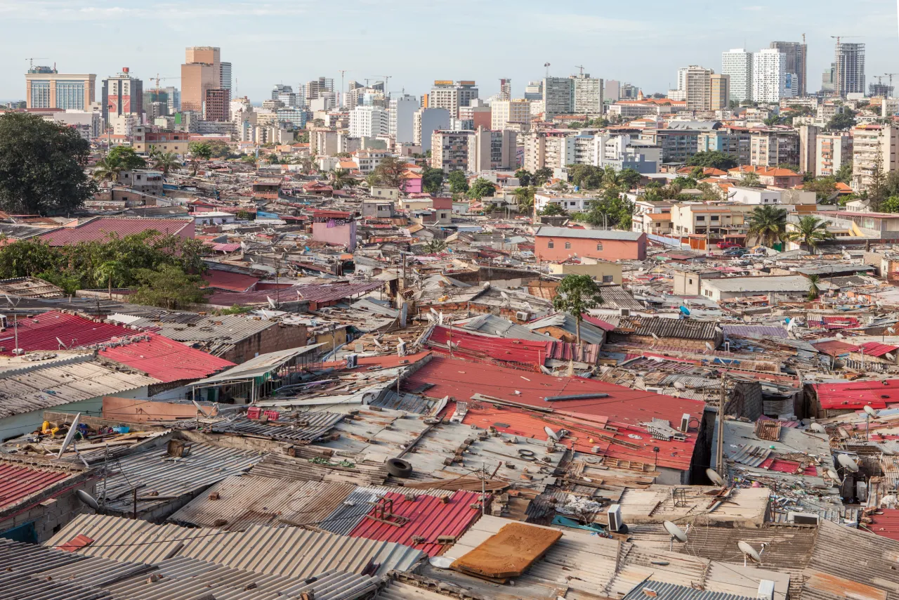 The line which divides the shacks of poor neighbourhoods from the rich area of Luanda