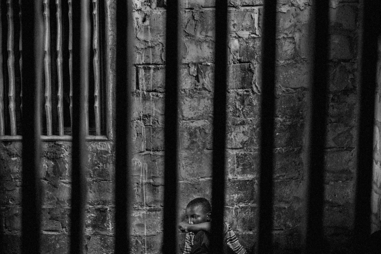 Contemporary Issues, first prize stories: Abdoulaye, 15, is a talibe imprisoned in a room with security bars to keep him from running away. Mário Cruz.