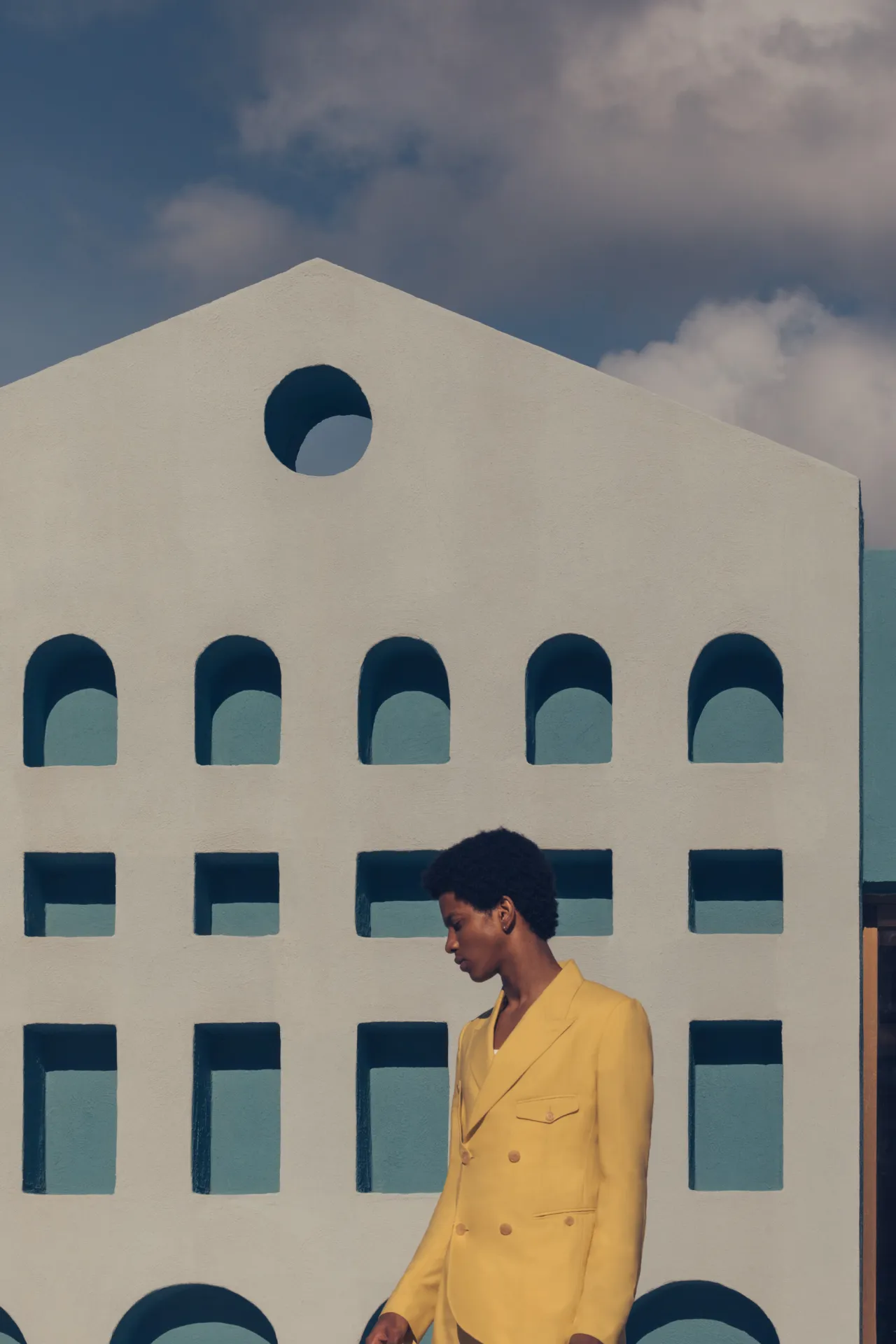 Rafael wears a double-breasted jacket by Dior. Photography by Romain Laprade for Kinfolk Magazine