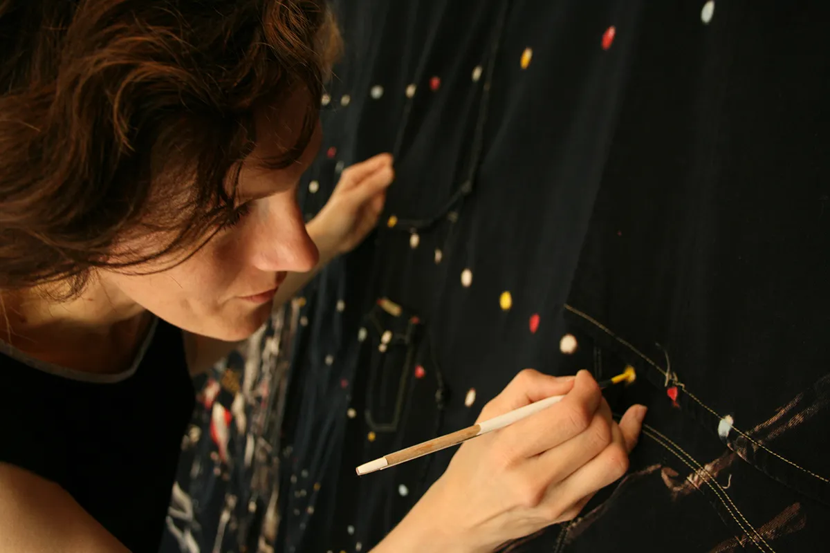 Pam Glew painting in the studio