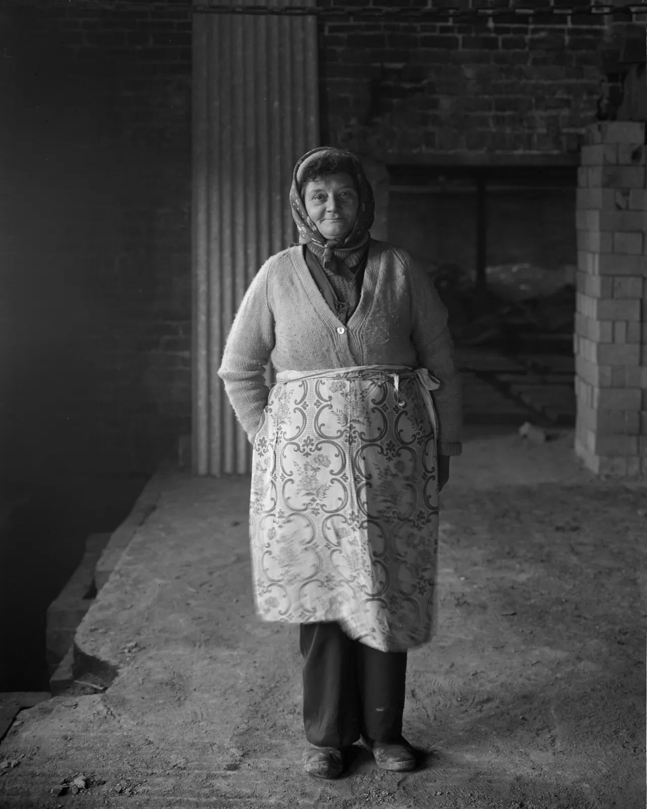 Female brick worker standing, 1983 © John Myers courtesy RRB PhotoBooks