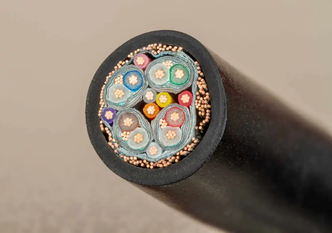 An HDMI cable, with four independently shielded twisted pairs © Open Circuits. Photography by Windell Oskay