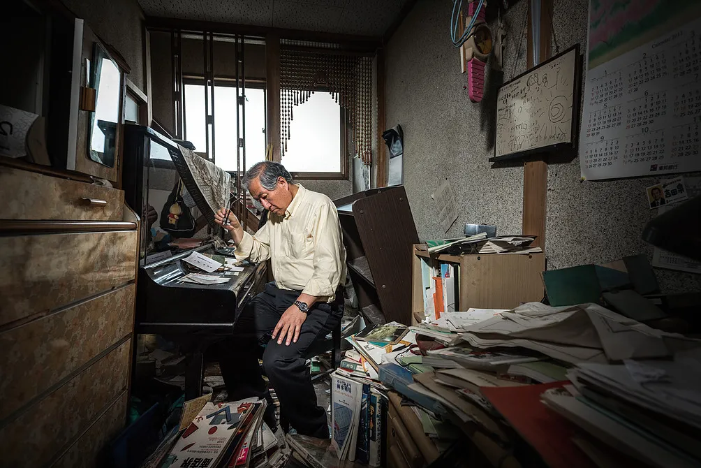 Kazuhiro Onuki at his old house in Tomioka