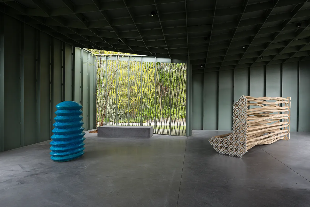 Richard Deacon, (left) 1999, Tomorrow And Tomorrow And Tomorrow 'B', Glazed ceramic, 153 x 133 x 80 cm, and (right) 2013, I Remember (3), Wood and stainless steel, 172 x 400 x 122 cm